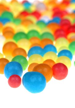 Colored candy on white background