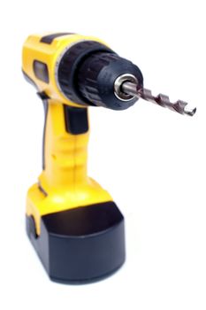 Hand yelow drill isolated