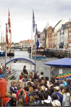 Boat touristic tours from Nyhavn, Copehnagen never stops 