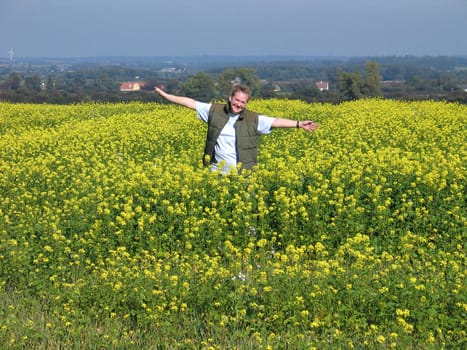 Happy woman in the meadow - freedom and bright future