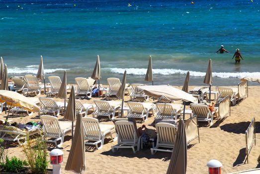 Sandy beach along Croisette promenade in Cannes France