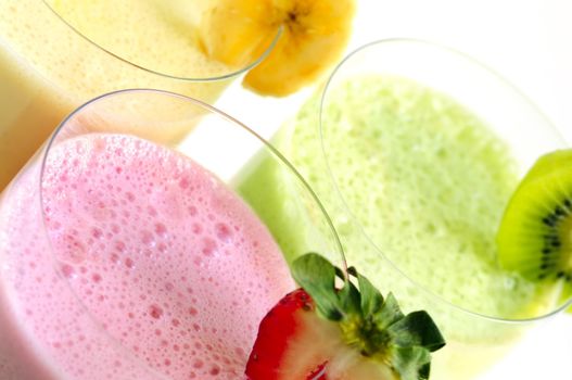 Assorted fruit and berry smoothies close up