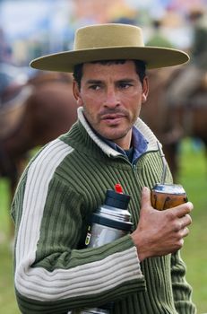 September 2008 Montevideo Uruguay - Gaucho drinking the traditional yerba tea