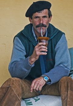 September 2008 Montevideo Uruguay - Gaucho drinking the traditional yerba tea