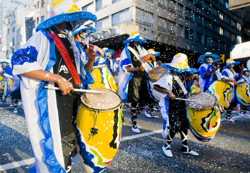 Montevideo Uruguay February 2009 - Candombe drummers  ,  Candombe is a drum-based musical style of Uruguay. Candombe originated among the African population in Montevideo and is based on Bantu African drumming with some European influence and touches of Tango.