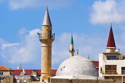 church and a mosque in the old city of Acre in Israel