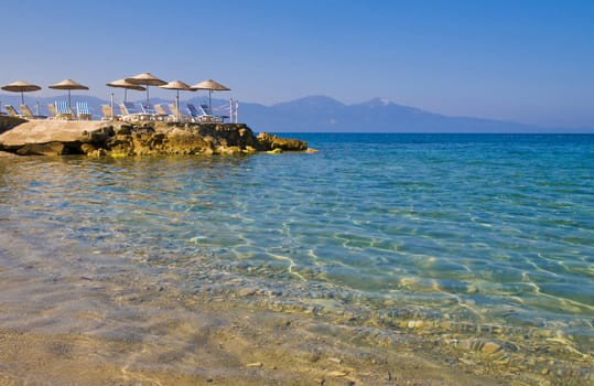 sunshades in Turkish resort in the Aegean sea