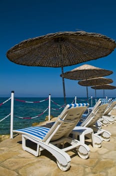 sunshades in Turkish resort in the Aegean sea