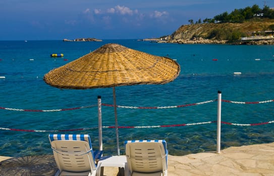 sunshades in Turkish resort in the Aegean sea