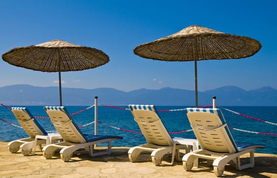 sunshades in Turkish resort in the Aegean sea