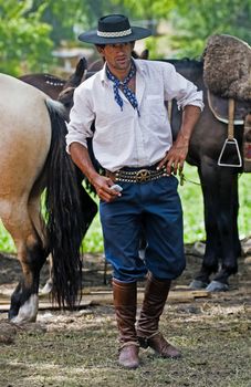 TACUAREMBO, URUGUAY - MAR 7 : Participant in the annual festival "Patria Gaucha" March 7, 2009 in Tacuarembo, Uruguay. It is one of the biggest festival in South America to celebrate gaucho culture