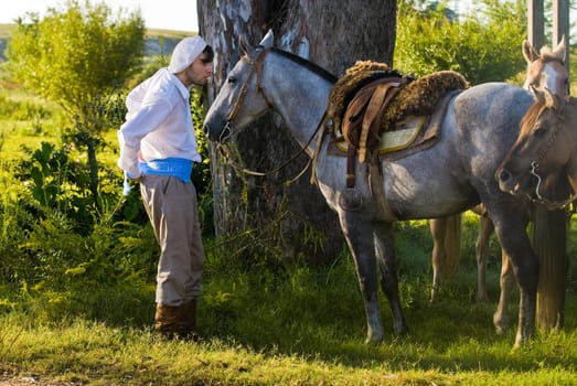 TACUAREMBO, URUGUAY - MAR 7 : Participant in the annual festival "Patria Gaucha" March 7, 2009 in Tacuarembo, Uruguay. It is one of the biggest festival in South America to celebrate gaucho culture