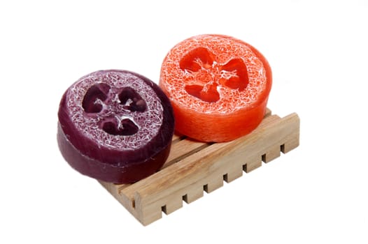 Fragrant soap on a wooden shelf                                