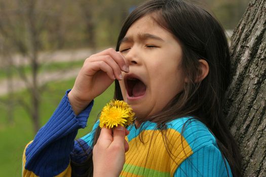 Girl allergic to  dandelion flower