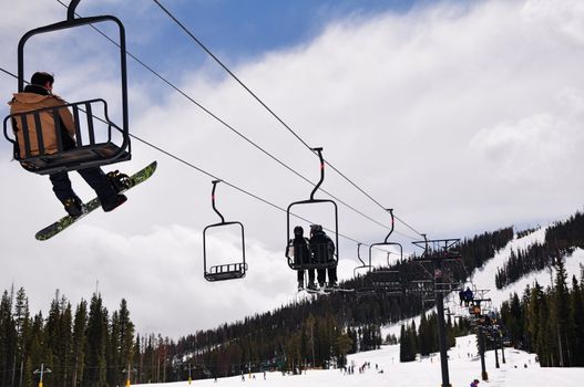 Skiers enjoy a day of fun at a Colorado ski resort in the Rocky mountains.