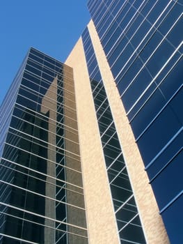 Mirror reflection of office building in the downtown area.