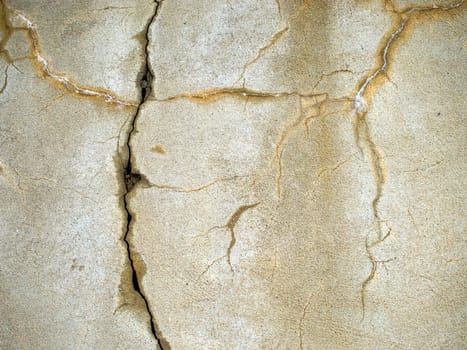Partialy broken and cracked plaster wallpaper texture.