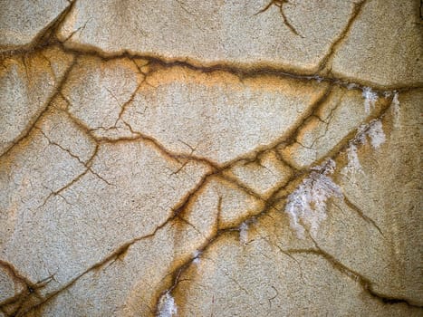 A decaying and rusty wall texture.