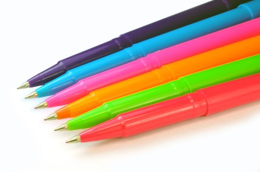 Pens on white background