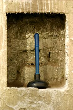The sanitary tool in niche in wall