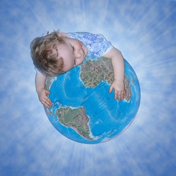 the child is embraces the globe