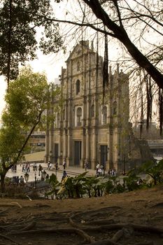 The famous ruins of St. Pauls Cathedral in Macau, a popular tourist attraction and a reminiscence of the old Portugese colonial rule.