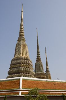 The largest temple in Bangkok, famed for its huge and majestic reclining Buddha measuring 46 meters long and covered in gold leaves.