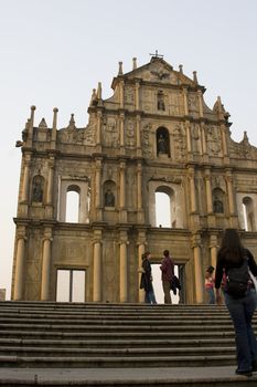 The famous ruins of St. Pauls Cathedral in Macau, a popular tourist attraction and a reminiscence of the old Portugese colonial rule.