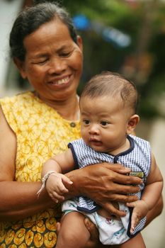 The Indonesian woman with the grandson