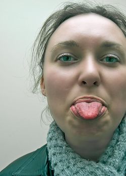 Close up of a woman sticking her tongue out