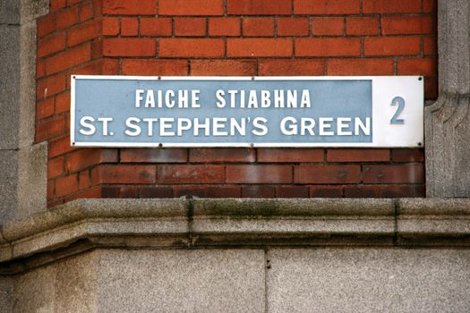 Famous square with a park in Dublin - name written in English and Irish