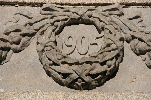 Year 1905 - bas relief decoration on a building in Dublin