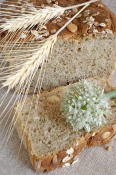 Oniony bread and its slice with spikes and onion flower