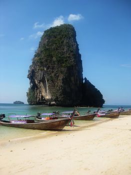 Phra Nang cave beach with longtail boats in Thailand