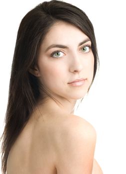 portrait of a beautiful young brunette woman against white background