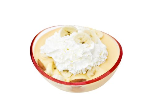 Banana pudding with sliced bananas and whipped cream isolated on a white background