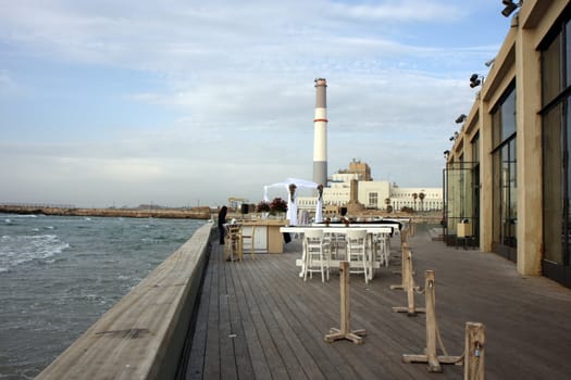 Chuppah with industrial view and sea
