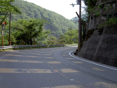 A road curve in Japan on the Uji riverside.