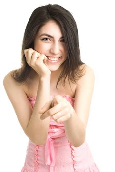 beautiful laughing girl points at us, isolated against white background