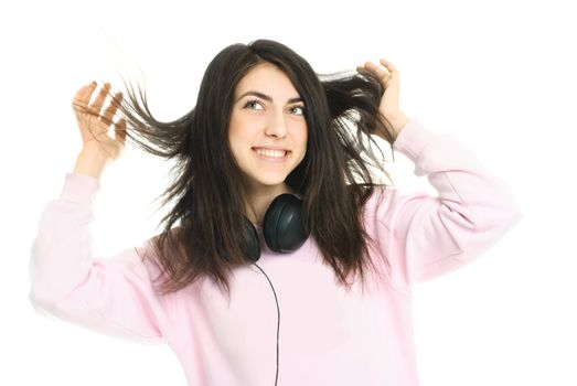 portrait of a happy young teenage girl with earphones, isolated against white background