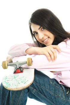 happy beautiful teenage girl with a skate board against white background