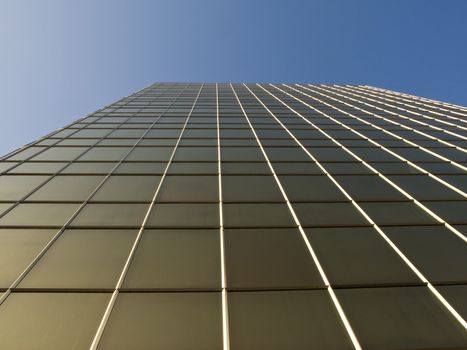 Golden tinted windows on office building.