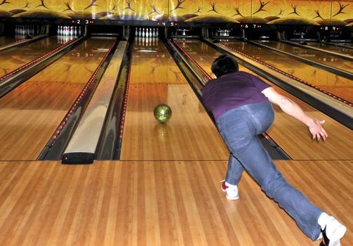 	
man plays bowling