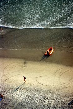 View of sandy beach from hill