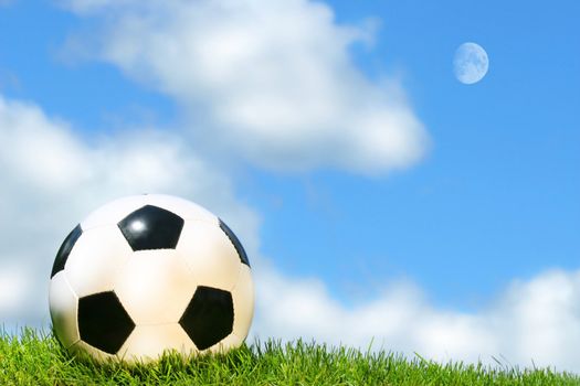Soccerball against a blue sky