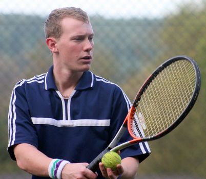 James ready to serve his game of tennis.