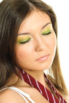 portrait of a beautiful brunette girl with colorful intensive makeup against white background