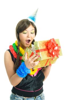pretty brunette surprised girl opening her birthday present