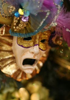 Mask of the Carnival with suffering grimace