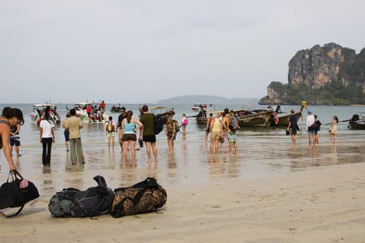 Tourists at Ao Railay beach are going out with the longtail boats to nearby islands. A usual, but special sight on Ao Railay. 